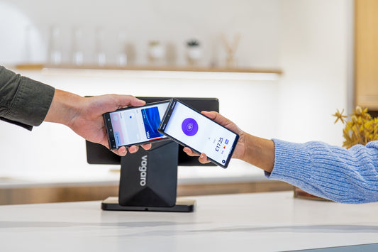 Mobile payment transaction being completed with phone.